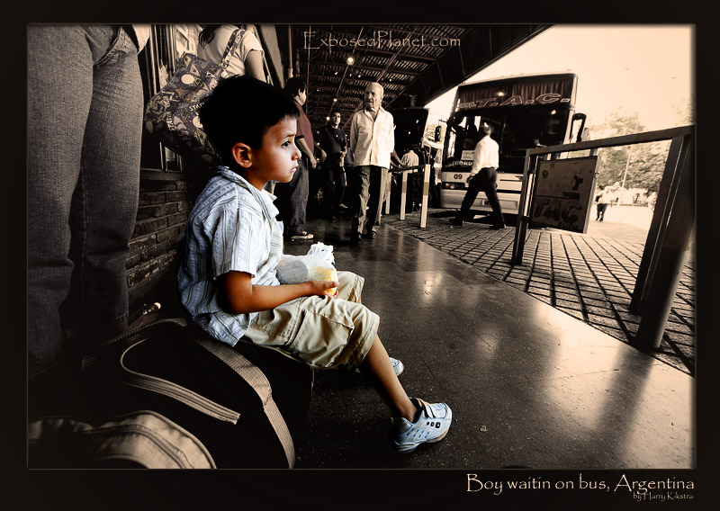 Boy waitin on a bus in Mendoza, Argentina