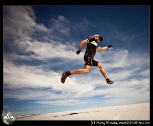 Harry jumps in his Santos outfit, for joy on the Salar de Uyuni, on WorldOnaBike.com, from Alaska to Ushuaia on a bicycle Harry jumps in his Santos outfit, for joy on the Salar de Uyuni, on WorldOnaBike.com, from Alaska to Ushuaia on a bicycle