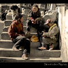 Street kids in Nyalam, Tibet emptying jam jars