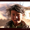 Tibetan girl with hair blowing