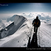 Climber descending on the summit ridge of Denali, Alaska USA